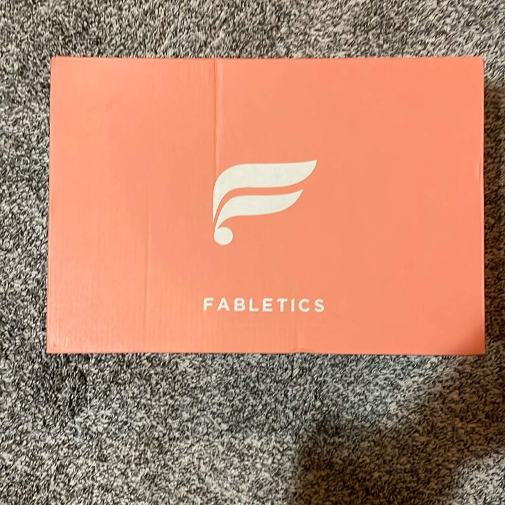 NWOT. Fabletics,“The Everydayy Sneaker ll”, white/light grey/silver. Size 7.